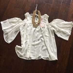 Small flowy ivory top with cold shoulders